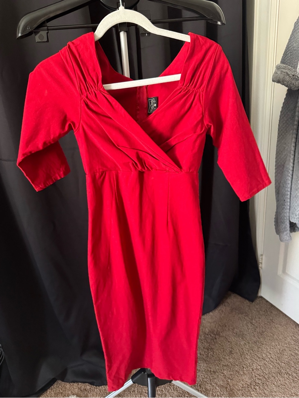 Red V-neck sheath dress